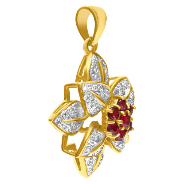 Ruby and diamond flower pendant and ring set in 18k. 1.00 carats in diamonds