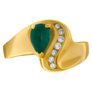 Pear shaped emerald ring with diamond accents in 14k gold. Size 10