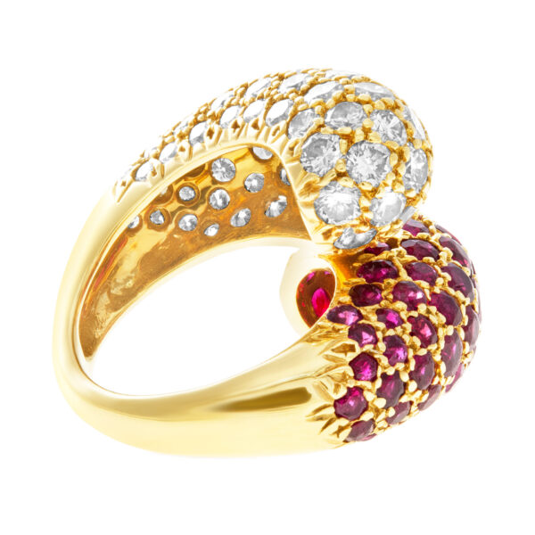 Bypass ruby & diamond ring in 18k yellow gold. 2.5cts in diamonds, 3.00cts rubies. Size 3