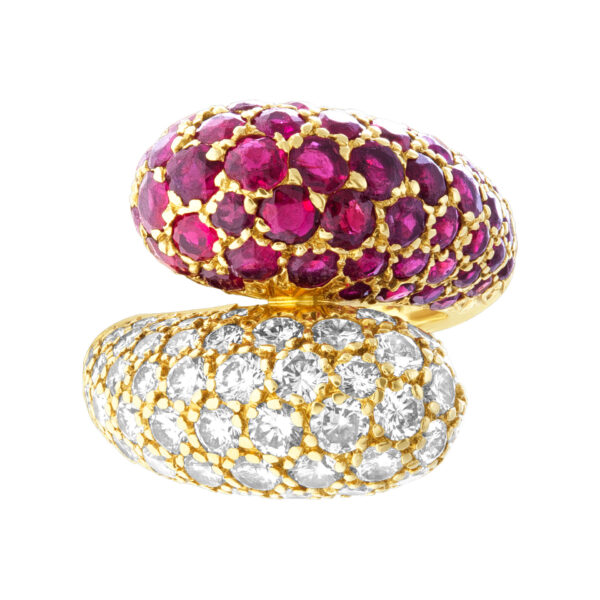 Bypass ruby & diamond ring in 18k yellow gold. 2.5cts in diamonds, 3.00cts rubies. Size 3