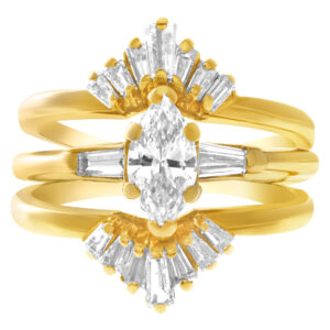 Marquise & baguette diamond ring set in 14k yellow gold. 0.90 carats. Size 5