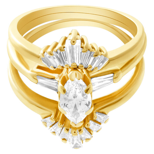 Marquise & baguette diamond ring set in 14k yellow gold. 0.90 carats. Size 5