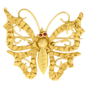 Butterfly pin set in 14k yellow gold