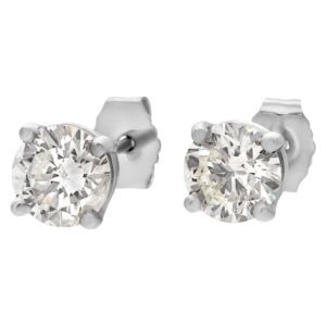 GIA certified diamond studs 0.77 carat (K color, I2 clarity) and 0.72 carat (L color, SI1 clarity)