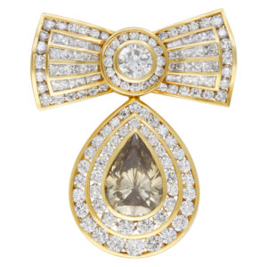 Kutchinsky diamond bow pin in 18k. GIA Certified. Total diamond weight 13.8 carats.