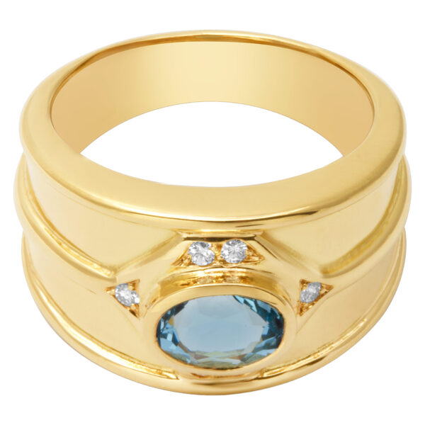 Aqua blue topaz ring with diamond accents set in 18k yellow gold