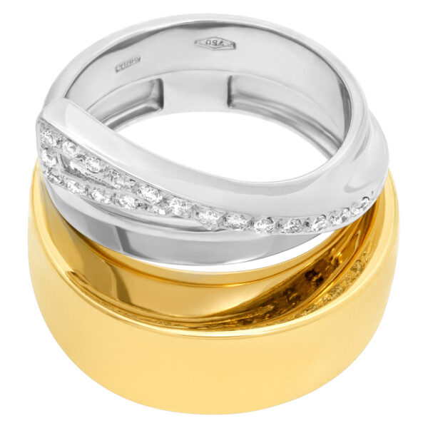 Interesting ring in 18k white and yellow gold with diamond swirl