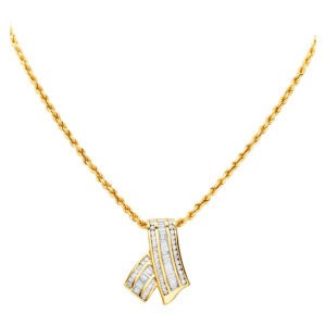 Cute diamond ribbon shaped pendant in 14k gold , with approximately 1 carat of diamonds.