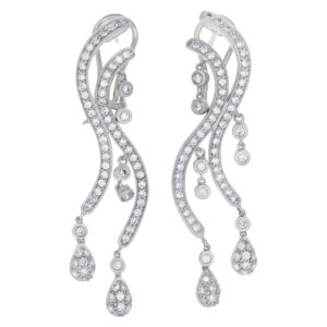 Diamond swirl earrings in 18k white gold; approximately 1 carat