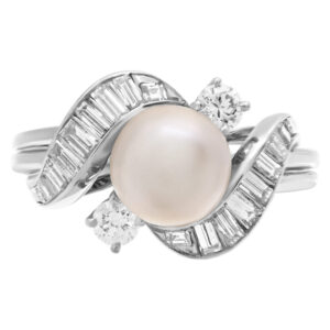 Pearl ring with diamond accents in platinum