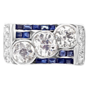 Vintage past, present, future mine cut diamond ring with carre cut sapphire accents in platinum, approximately 2 carats in diamonds