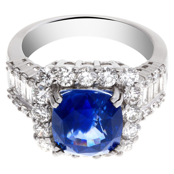 Sparkling 5.73 carat blue sapphire ring with diamond accents in 18k white gold