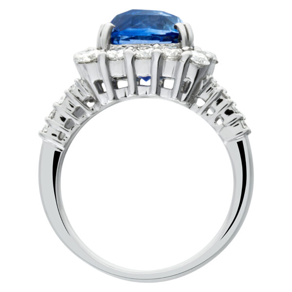 Sparkling 5.73 carat blue sapphire ring with diamond accents in 18k white gold