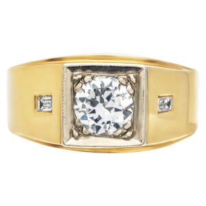 Classic gents 14k yellow gold diamond ring with an approximate 0.75 cts center round diamond with two side baguette diamond accents