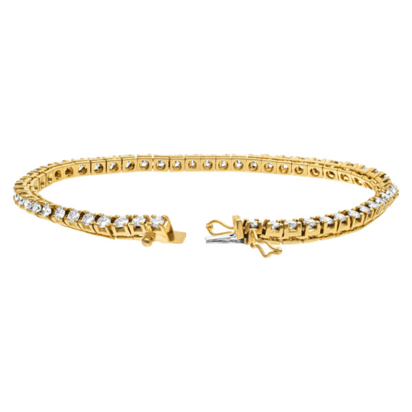 14k gold diamond line bracelet with over 3cts in round diamonds