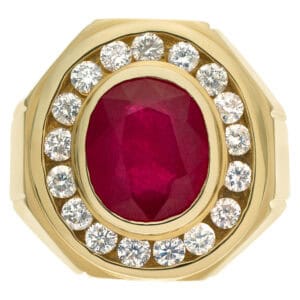 Large oval ruby ring in 18k with 2.50 cts in pave diamonds