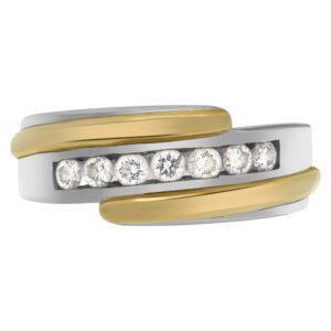 "Lucky Seven"  diamonds weding band. Seven full cut round  brilliant diamonds set in 14K white & yellow gold.