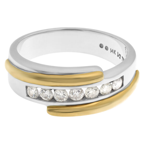 "Lucky Seven"  diamonds weding band. Seven full cut round  brilliant diamonds set in 14K white & yellow gold.