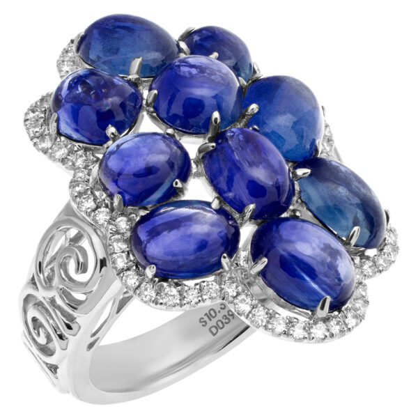 Blue cabachon tanzanite ring with diamond accents in 18k white gold