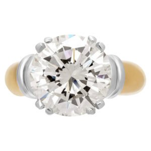 GIA certified round brilliant cut diamond 5.98 carat (M color, VS2 clarity) ring set in 18k setting