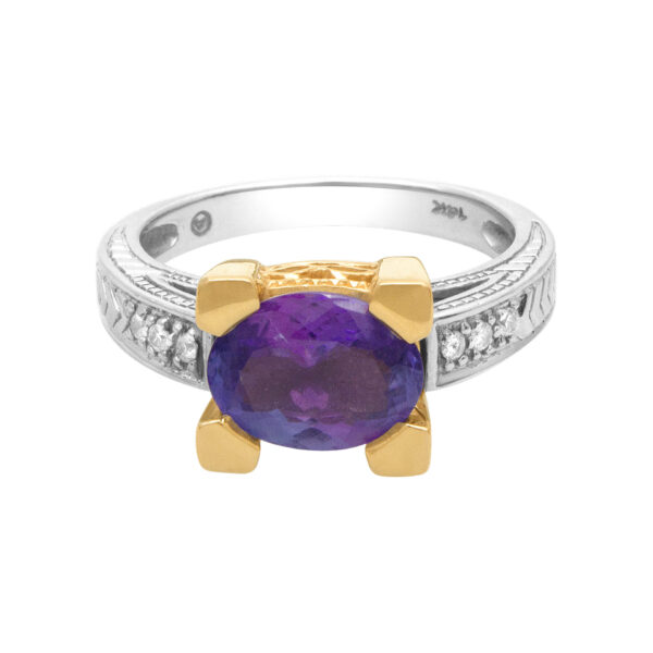 Tanzanite ring (1.50 cts) with diamond accents in 14k white and yellow gold