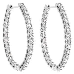 Diamond oval hoop earrings in 14k white gold. Approx. 2 carats