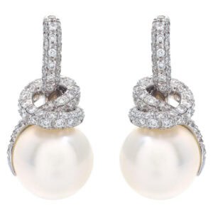 Mikimoto Milano collection south sea pearl earrings with high grade, excellent luster, round shape pearl of 12.3mm with very clean surface with silver body and rose overtone