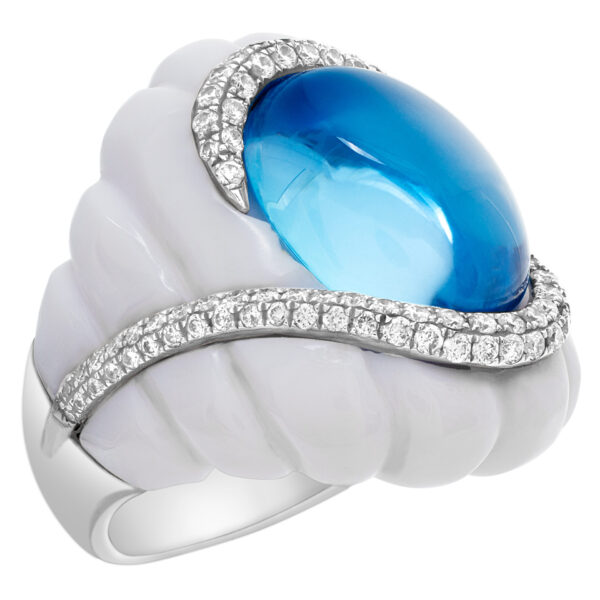 Michael Christoff agate and topaz ring. The floating cabochon topaz of sky blue color and 14.43 carat is surrounded by a swirl of round G-H, I1-I2  diamond of 0.75 carats and a 31.83 carat fancy cut white agate stone.