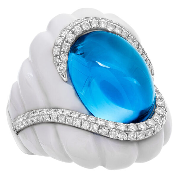 Michael Christoff agate and topaz ring. The floating cabochon topaz of sky blue color and 14.43 carat is surrounded by a swirl of round G-H, I1-I2  diamond of 0.75 carats and a 31.83 carat fancy cut white agate stone.