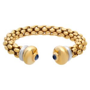 Box link bangle with sapphire cabachon end caps in 18k