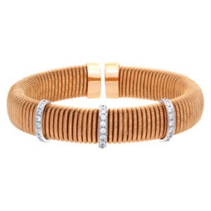 Stylish Italian design wrapped coil bangle in 18k rose gold with 3 diamond bar stations.