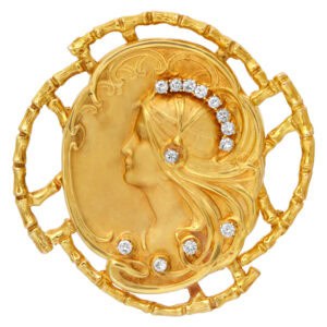 Art Nouveau brooch/pendant head of a maiden with head band & flowing golden hair  accented with diamonds