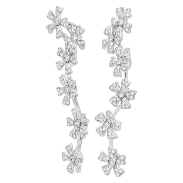 Hanging pave diamond floating flower earrings in 18K white gold.