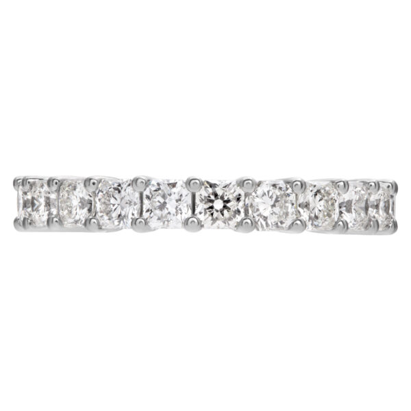 Diamond eternity band with 22 radiant cut diamonds, totaling 3.35 carats set in platinum.