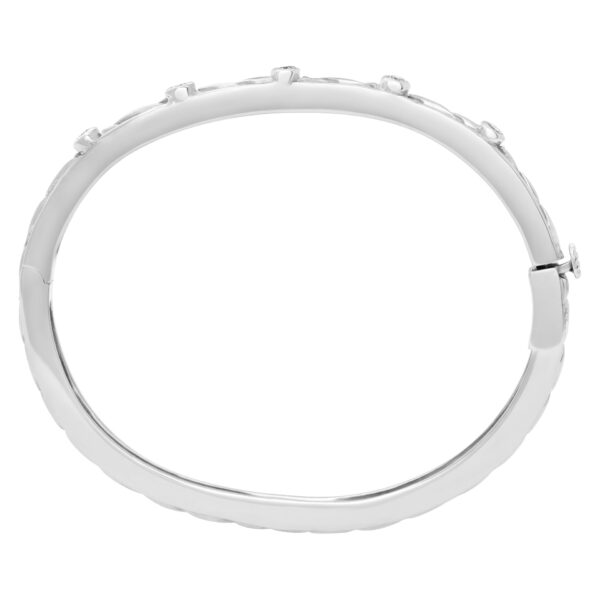 Beautiful bangle with five diamonds total  0.50 carats set in 14k white gold