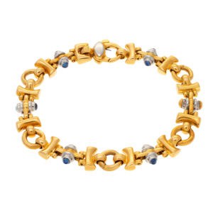 Italian link bracelet with cabochon sapphire accents in 18k