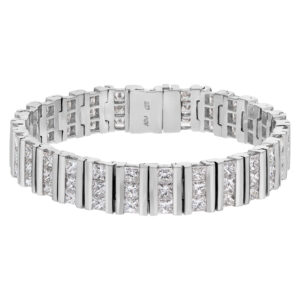 Channel set princess cut diamond bracelet in 18k white gold, over 16.20 carats in princess cut diamonds