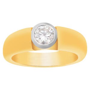 Diamond ring bezel set heavy mounted In 18k yellow gold ring.