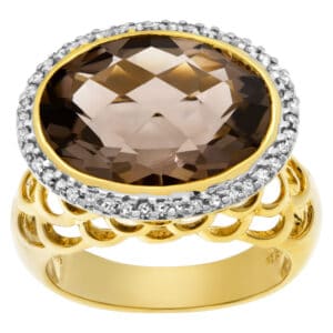 Oval topaz diamond ring set in 14k yellow gold