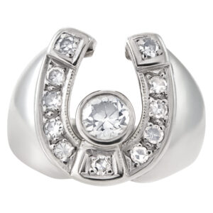 Lucky "Horse shoe" diamonds ring set in 14K white gold. Center bezeled set diamond approx 0.45 carat.