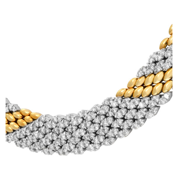 Stylish "PANTHERE" link style necklace with over 8.50 carats full cut round brilliant diamonds  set in 18K yellow gold.