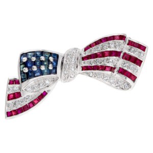 "Red, White & Blue". American flag "Bow" pin in 14k white gold  with diamonds, Sapphires & Rubies.