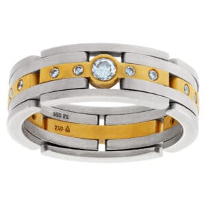 Flexible platinum and 18k yellow gold band with diamonds