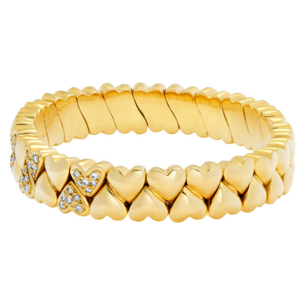 Flexible bangle in 18k with approximately 1 carat in pave diamonds