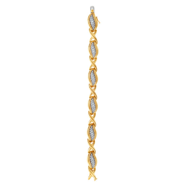 Stylish "Hugs & Kisses" bracelet with over 3.50 carats full cut round brilliant diamonds set in 18K yellow gold.