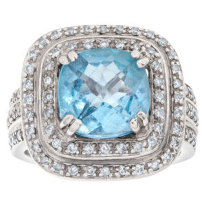 Blue topaz ring with diamond accents in 18k white gold