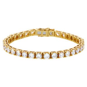 Diamond line bracelet with approximately 15 carats full cut round brilliant diamonds, set in 18k yellow gold