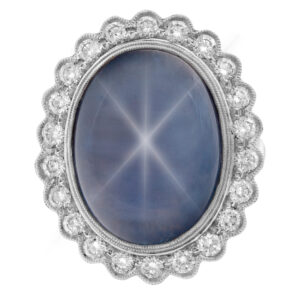 Glamorous cabochon Star Sapphire & diamonds ring set in Platinum