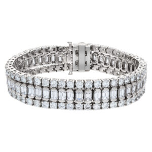 Breath-taking diamond bracelet with over 25 carats round brilliant & graduating emerald cut diamonds set in 18K white gold.