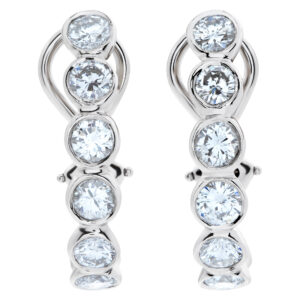 Platinum semi-hoop earrings with 3.75 carats in round diamonds